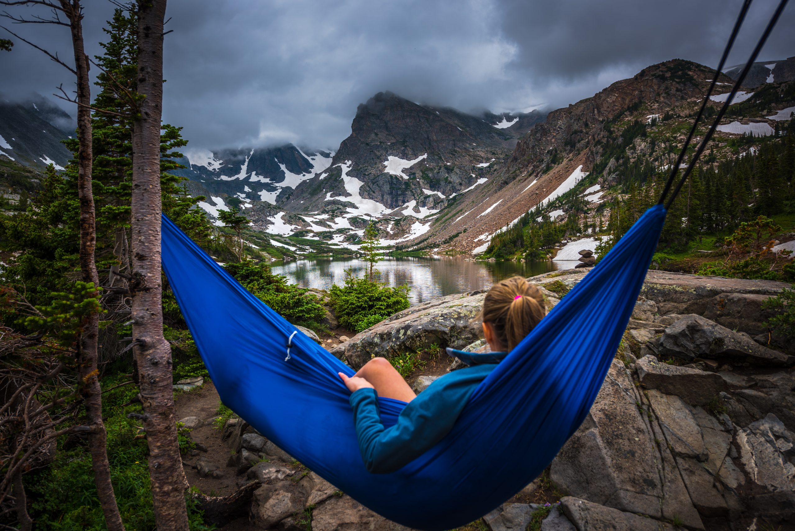 Women relaxing in hammock